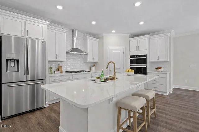 a bed room with a bed window and a dresser