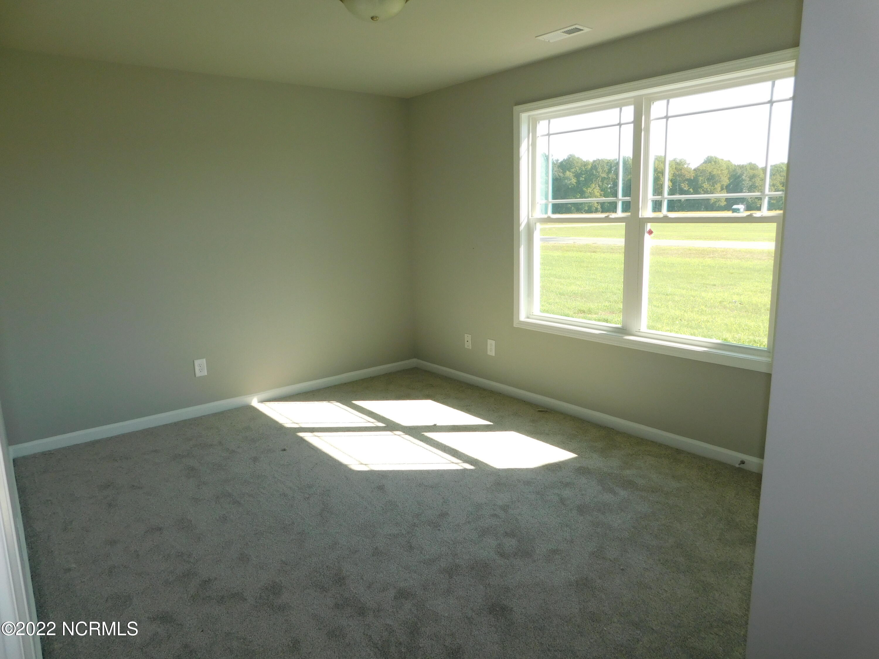 4141 Nahunta Road Pikeville, NC 27863 - Photo 17 of 19 Bedroom 2