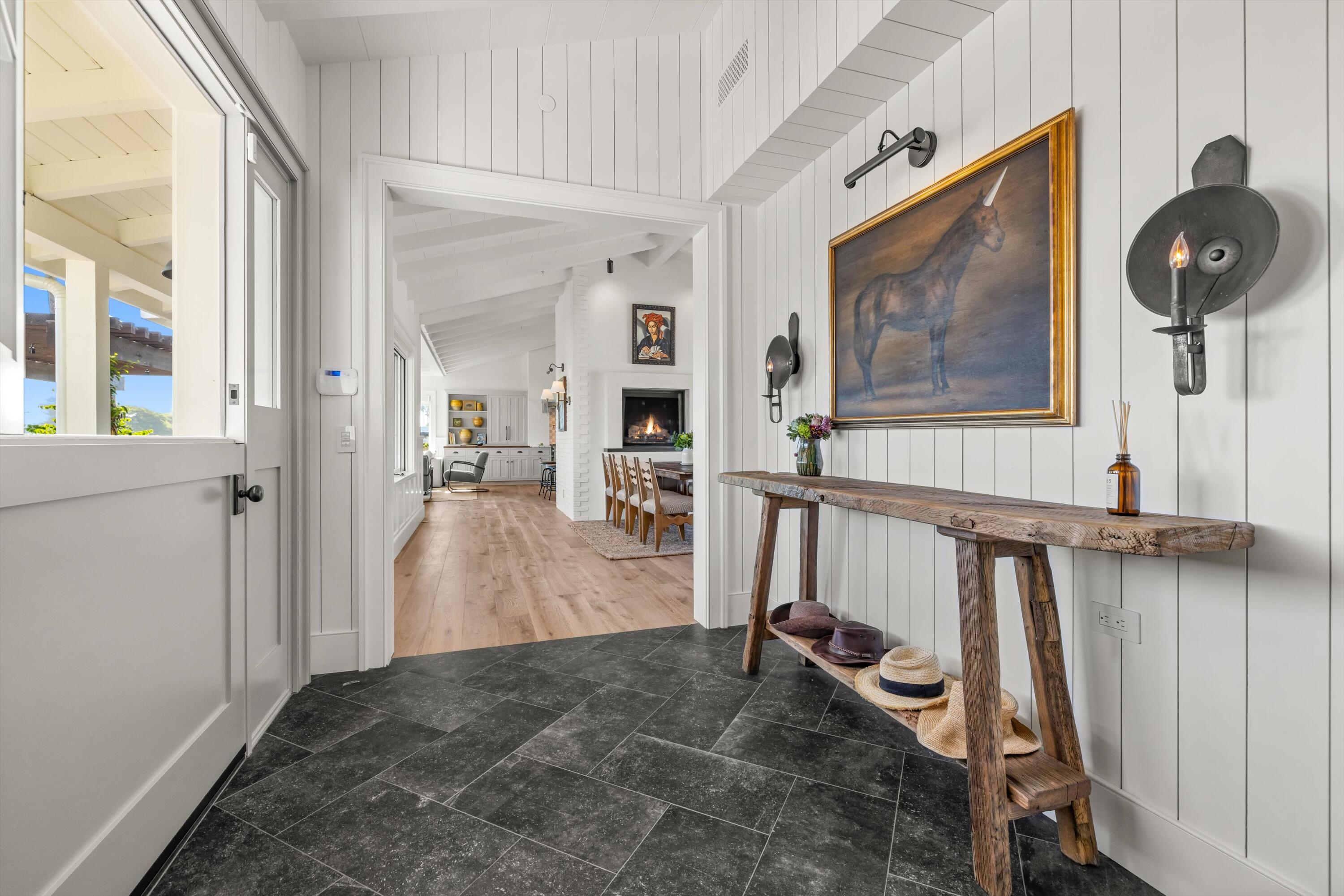 7 Yankee Farm Road Santa Barbara, CA 93109 - Photo 2 of 33 a view of livingroom with furniture and workspace