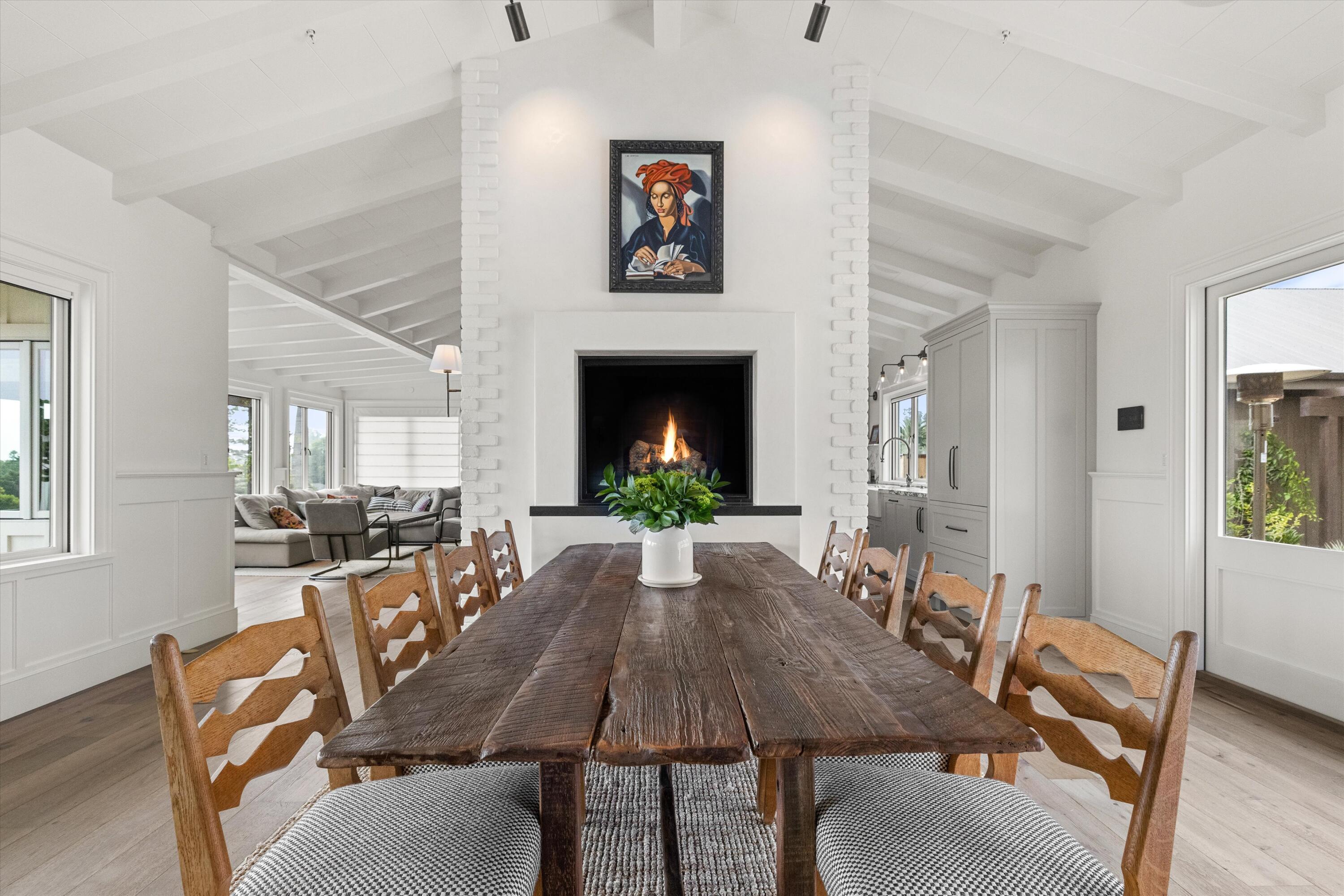 7 Yankee Farm Road Santa Barbara, CA 93109 - Photo 3 of 33 a view of a dining room with furniture window and wooden floor