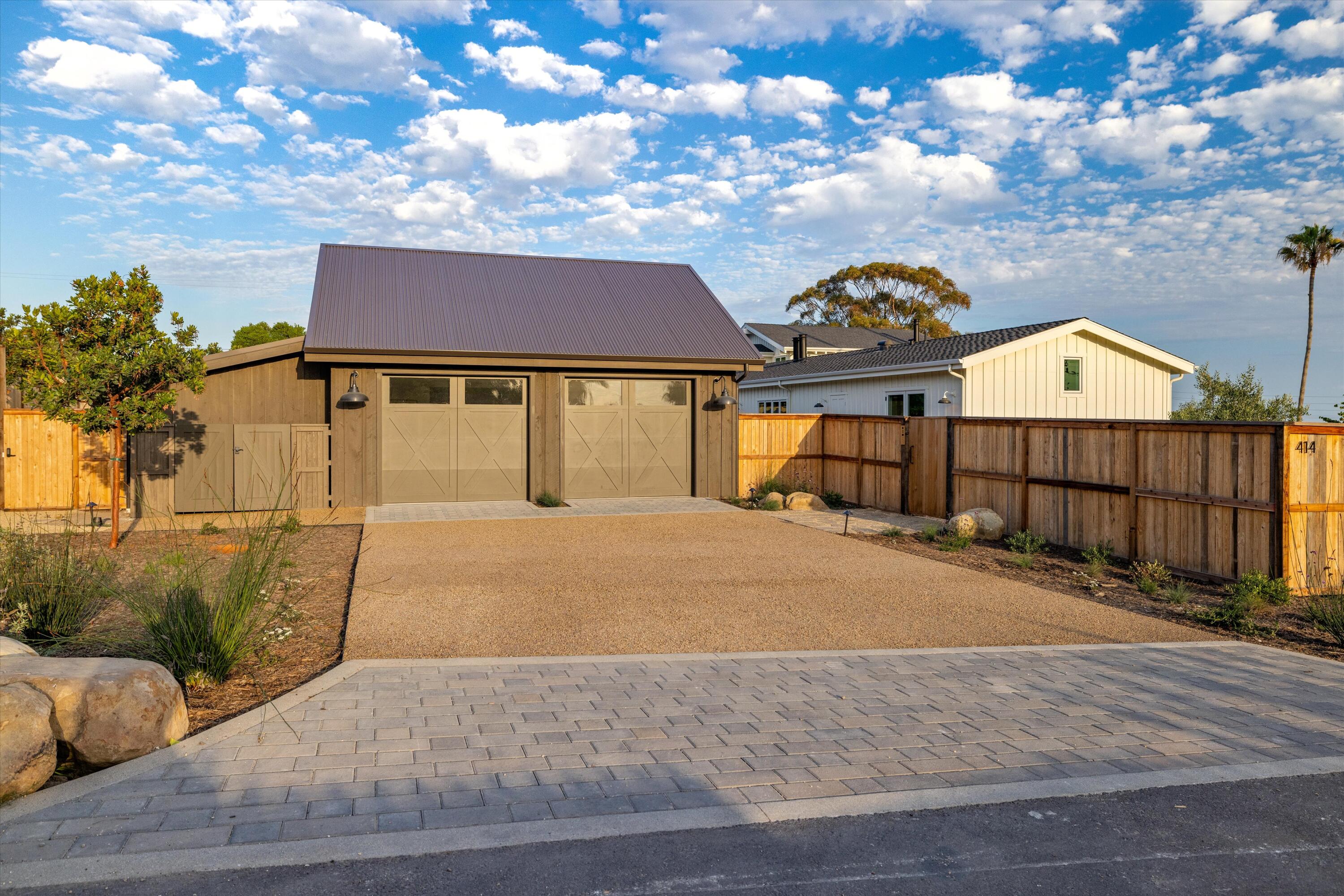 7 Yankee Farm Road Santa Barbara, CA 93109 - Photo 33 of 33 a front view of a house with a yard and garage