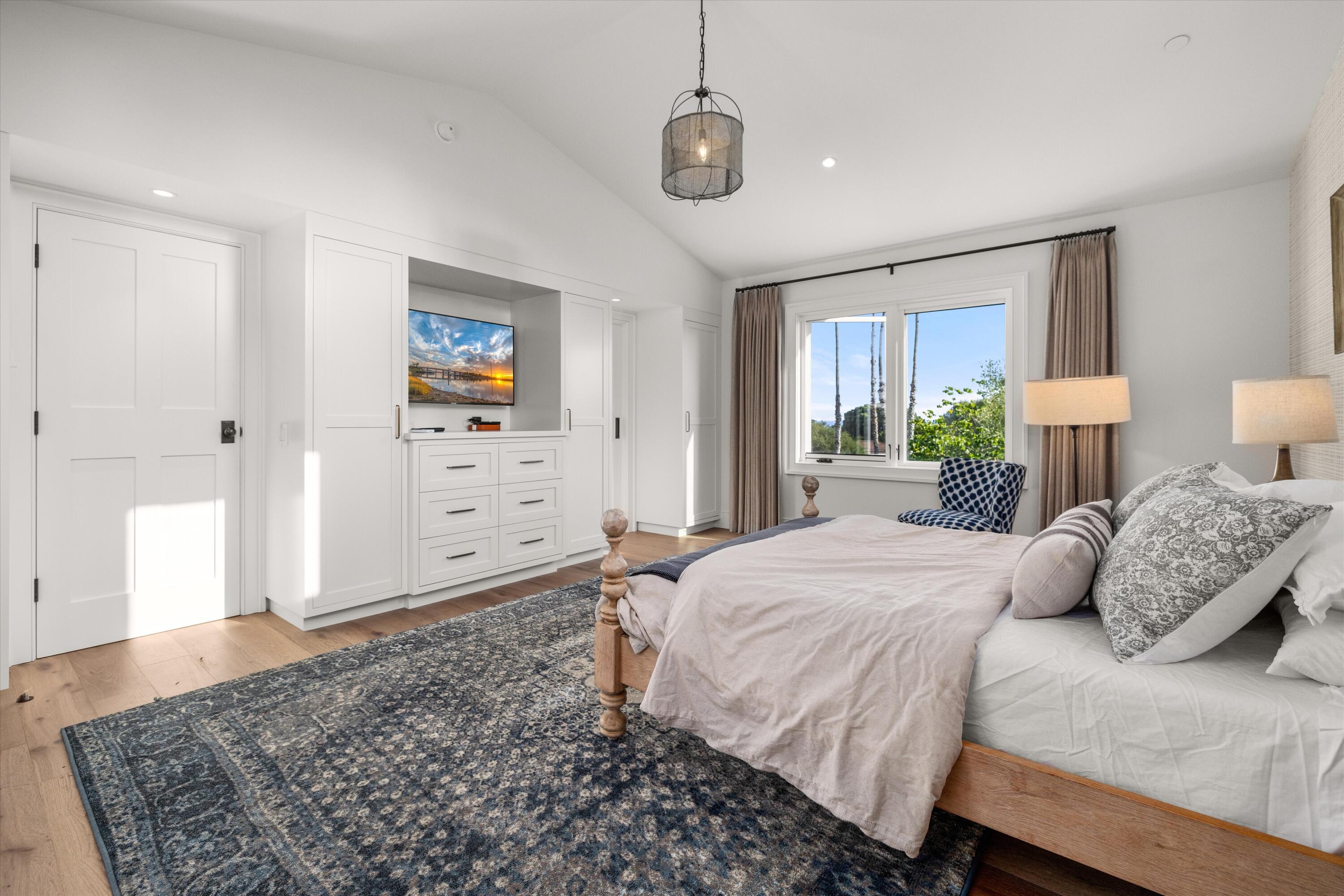 7 Yankee Farm Road Santa Barbara, CA 93109 - Photo 9 of 33 a bedroom with a bed and a dresser