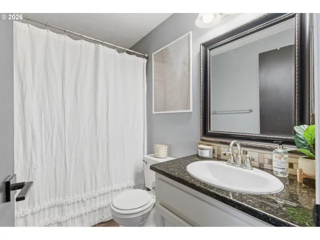 a backyard of a house with seating space