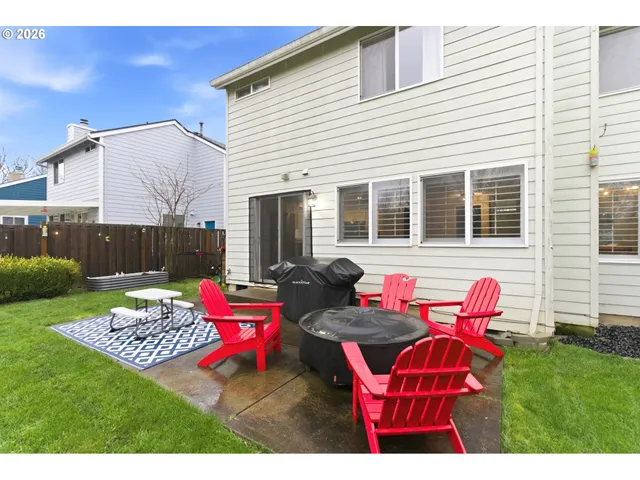 a childrens park with lots of swings and slides