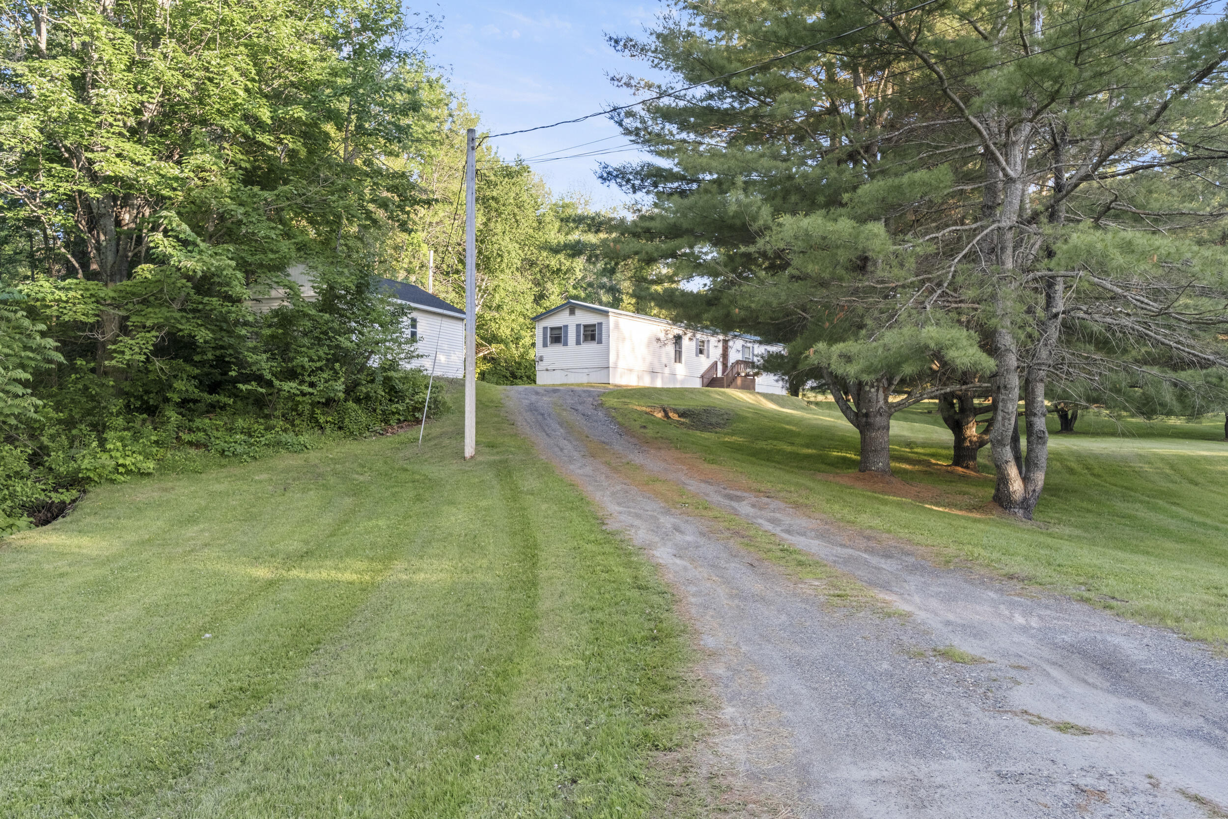 99 Rice Rips Road Oakland, ME 04963 - Photo 2 of 27 99_Rice_Rips_Rd-Exterior-1