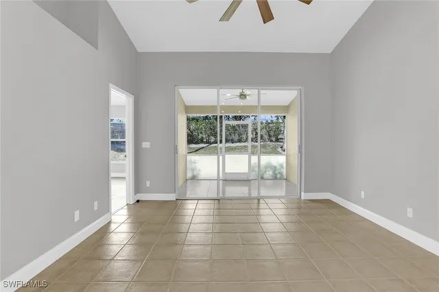 a view of an empty room and window