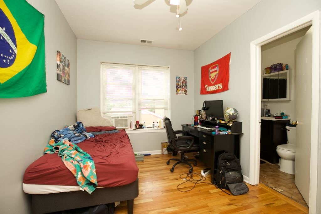 4511 Malden Street, Unit 3B Chicago, IL 60640 - Photo 14 of 20 a living room with furniture and a flat screen tv