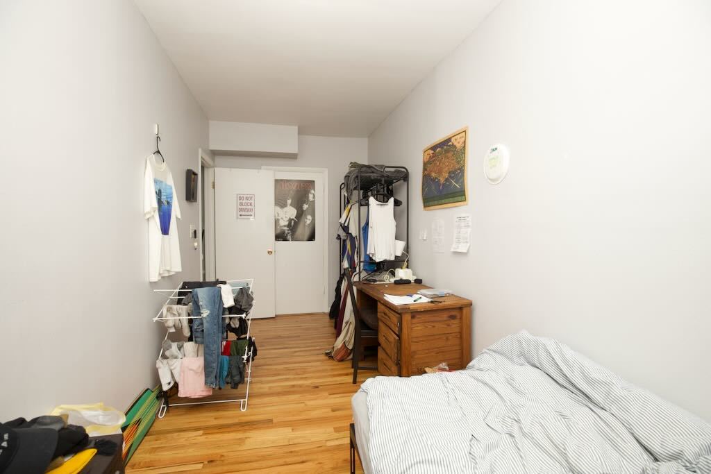 4511 Malden Street, Unit 3B Chicago, IL 60640 - Photo 19 of 20 a bedroom with bed and wooden floor