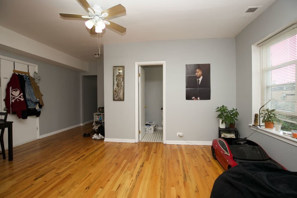 4511 Malden Street, Unit 3B Chicago, IL 60640 - Photo 6 of 20 a bedroom with a bed and a window