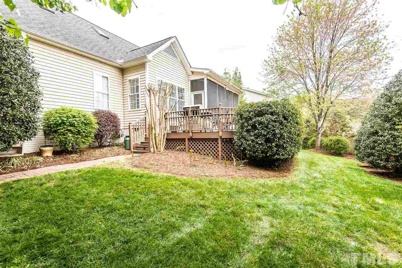 8200 Eden Close Court Raleigh, NC 27613 - Photo 13 of 15 front view of a house with a yard