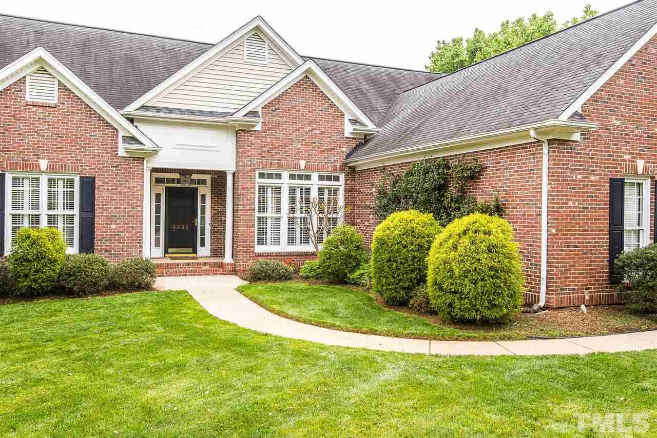 8200 Eden Close Court Raleigh, NC 27613 - Photo 15 of 15 a view of a house with backyard and garden