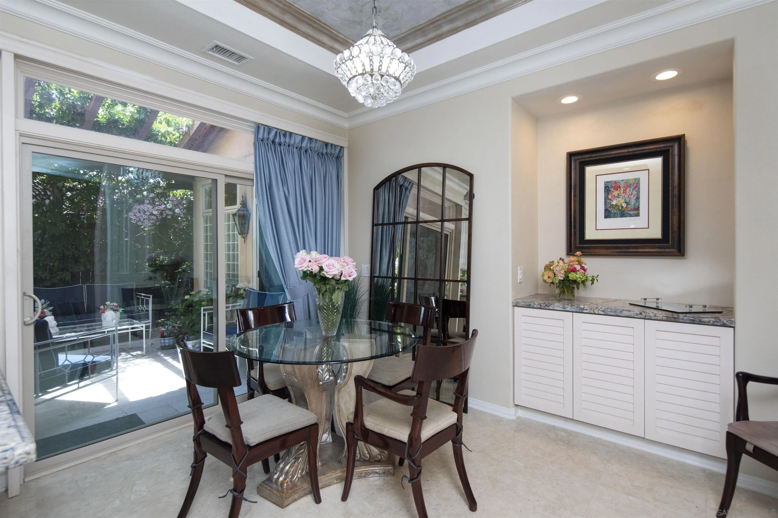 15448 Pimlico Corte Rancho Santa Fe, CA 92067 - Photo 19 of 31 a dining room with furniture a livingroom and chandelier