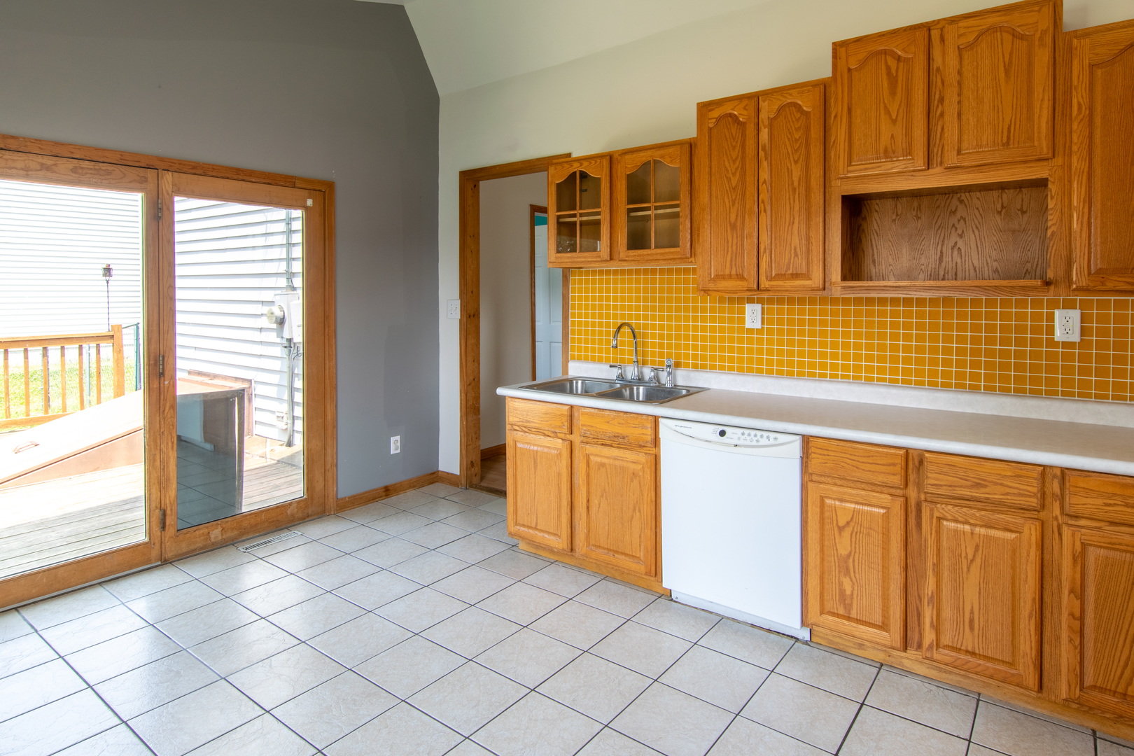 116 South 10th Street Rochelle, IL 61068 - Photo 4 of 19 a kitchen with a sink and cabinets