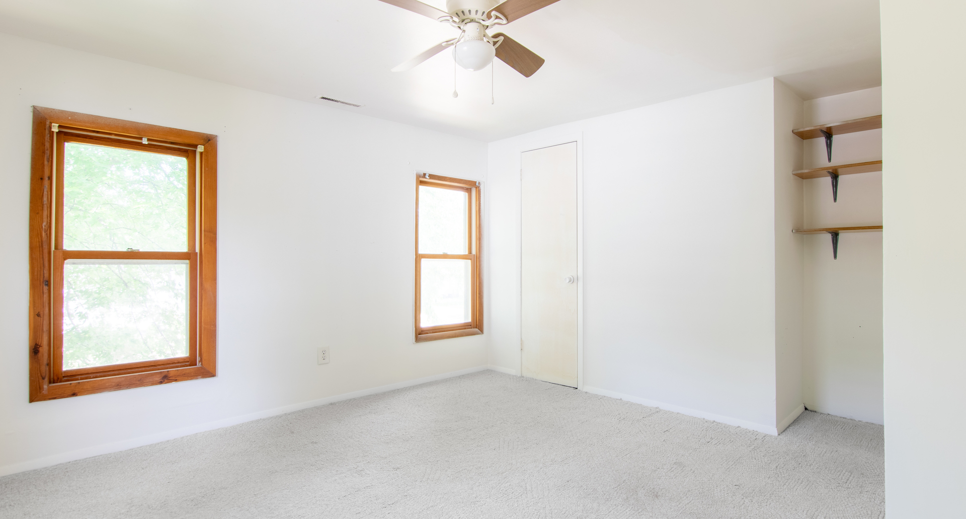 116 South 10th Street Rochelle, IL 61068 - Photo 10 of 19 an empty room with windows and closet