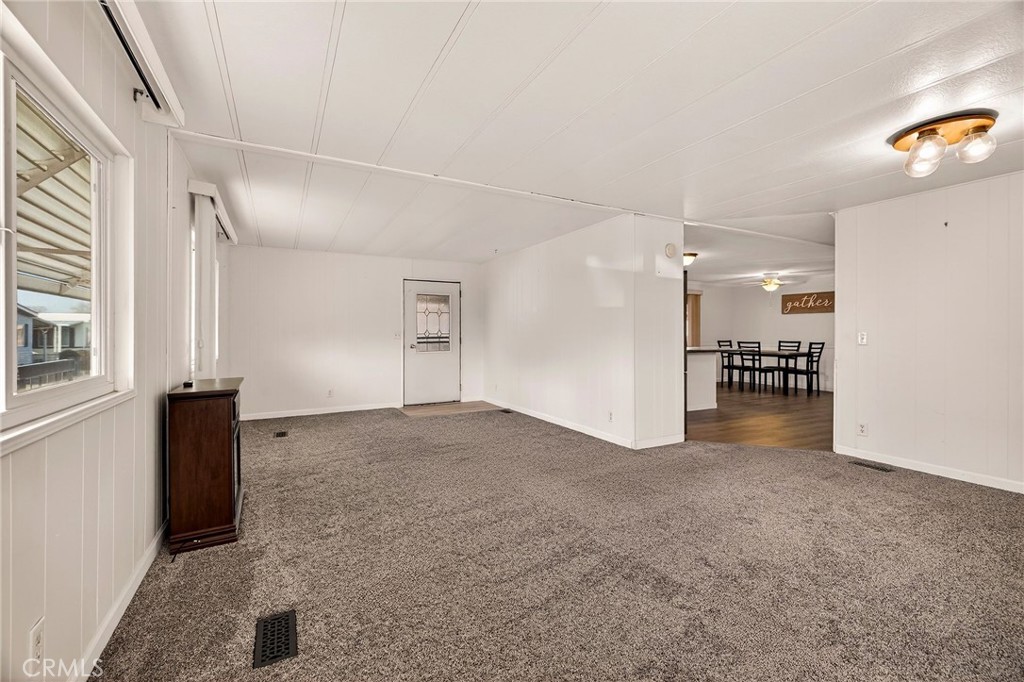 701 East Lassen Avenue, Unit 173 Chico, CA 95973 - Photo 13 of 49 a view of empty room with wooden floor