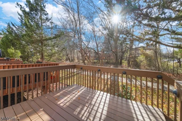 a balcony with wooden floor