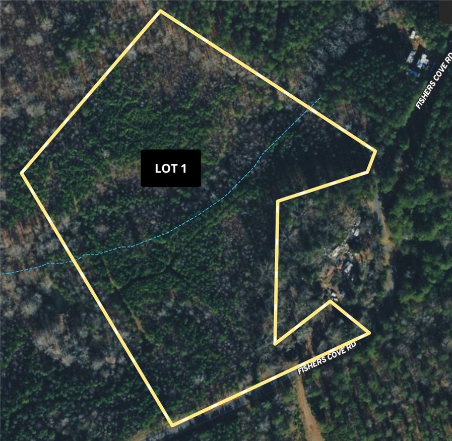 1 Fishers Cove Road, Unit LOT 1 Fair Play, SC 29643 - Photo 1 of 3 A spacious, wooded parcel offers a prime opportunity for custom development, featuring convenient road frontage and natural privacy.