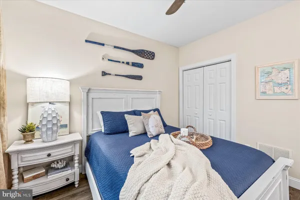 a bedroom with furniture and a fireplace