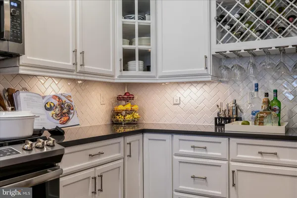 a kitchen with a cabinets and a stove