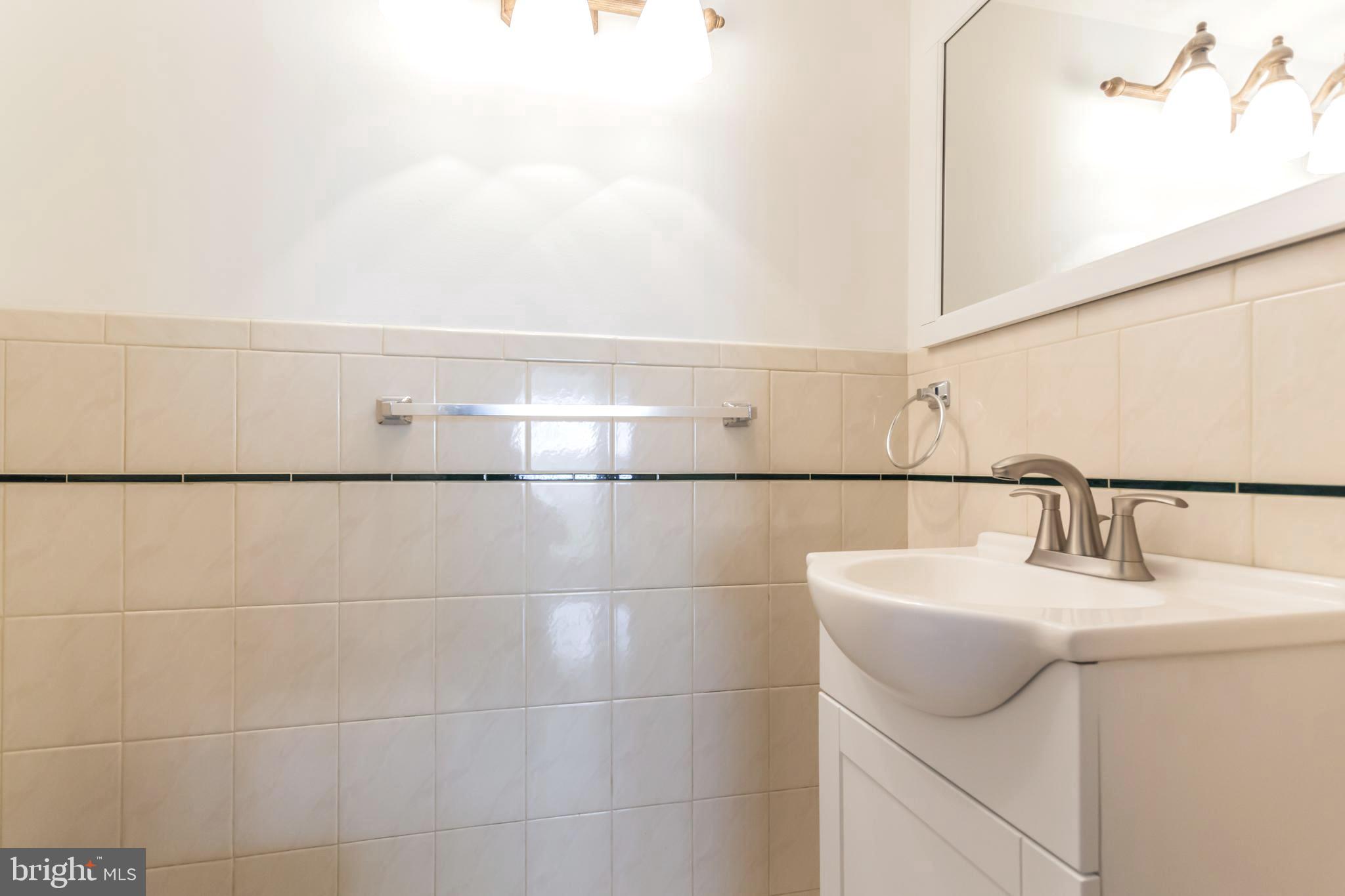 9731 Chapel Road Philadelphia, PA 19115 - Photo 15 of 27 Powder Room off of family room