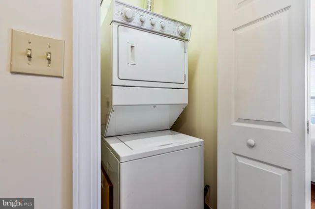 a front view of a house with a large window