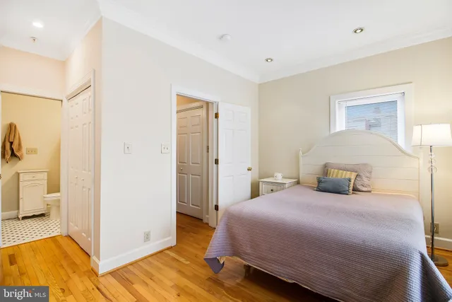 a front view of a house with a large window