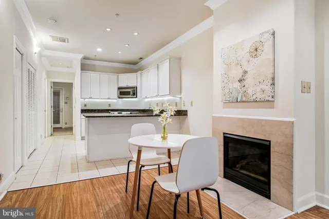 a view of roof deck with two lounge chairs