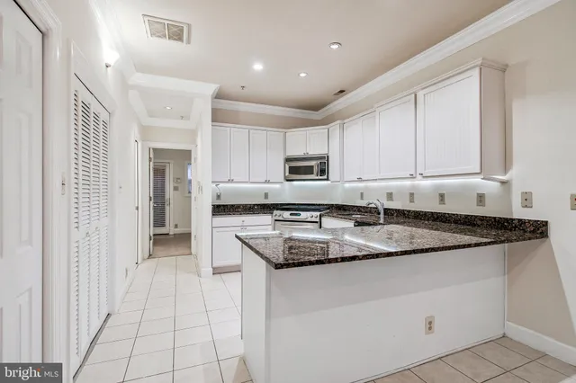 a view of swimming pool with tree s