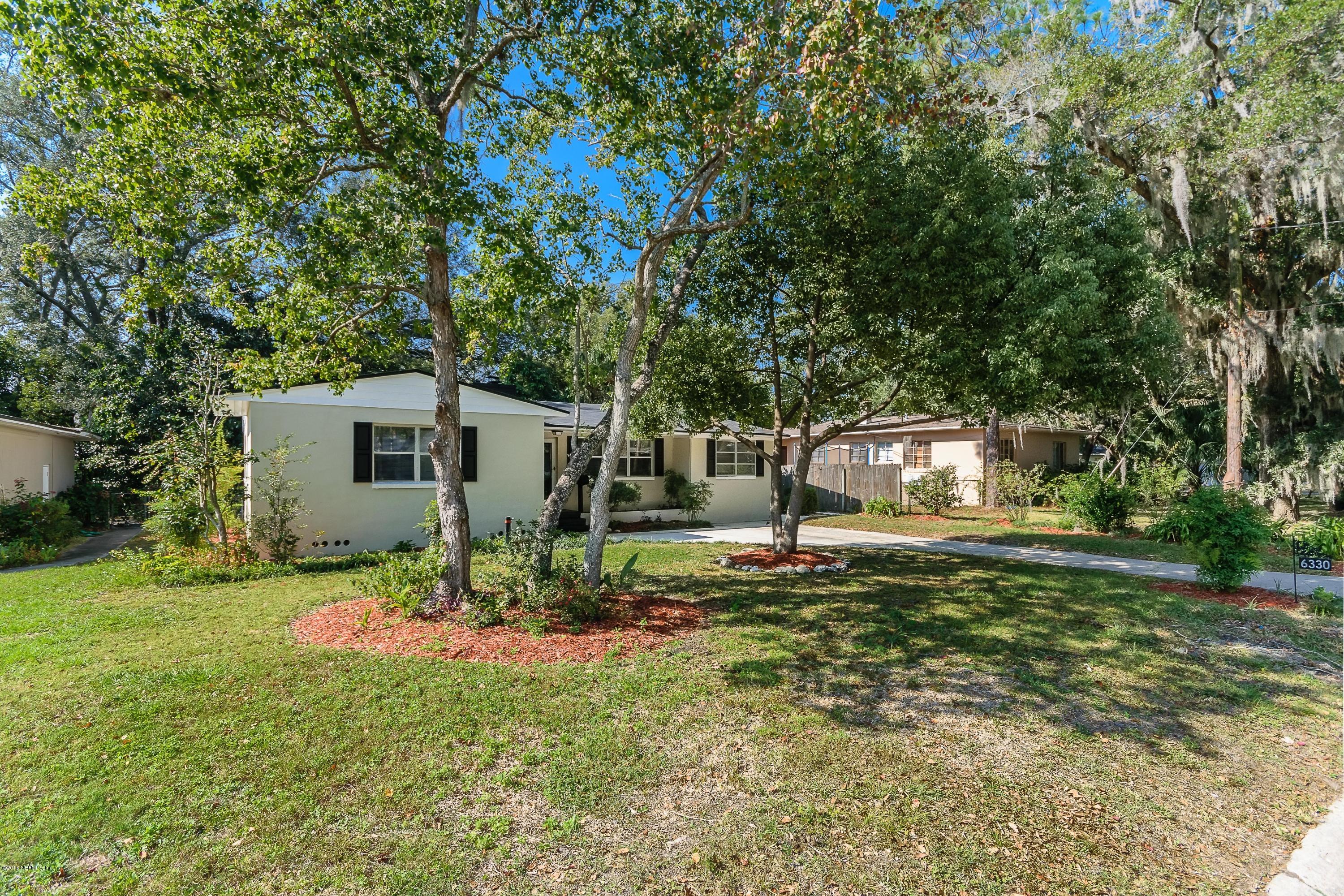 6330 Wesleyan Road Jacksonville, FL 32217 - Photo 2 of 17 a house view with a garden space