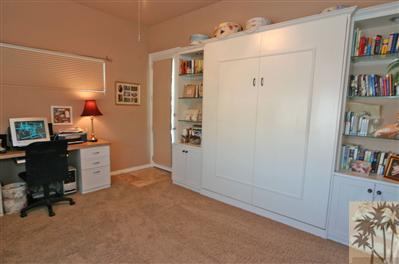 14 Orleans Road Rancho Mirage, CA 92270 - Photo 8 of 15 a view of a workspace with furniture