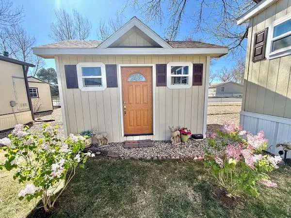 a front view of a house with an outdoor space