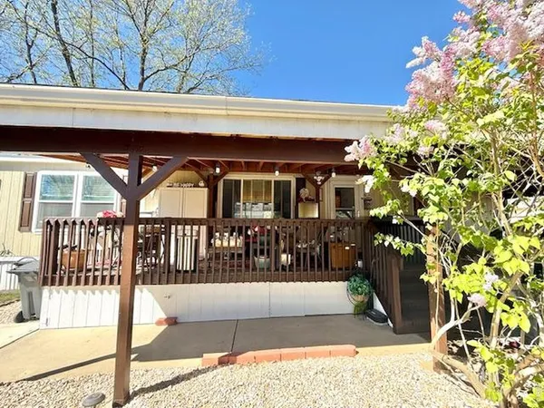 a view of house with a outdoor space