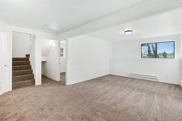 an empty room with an entryway