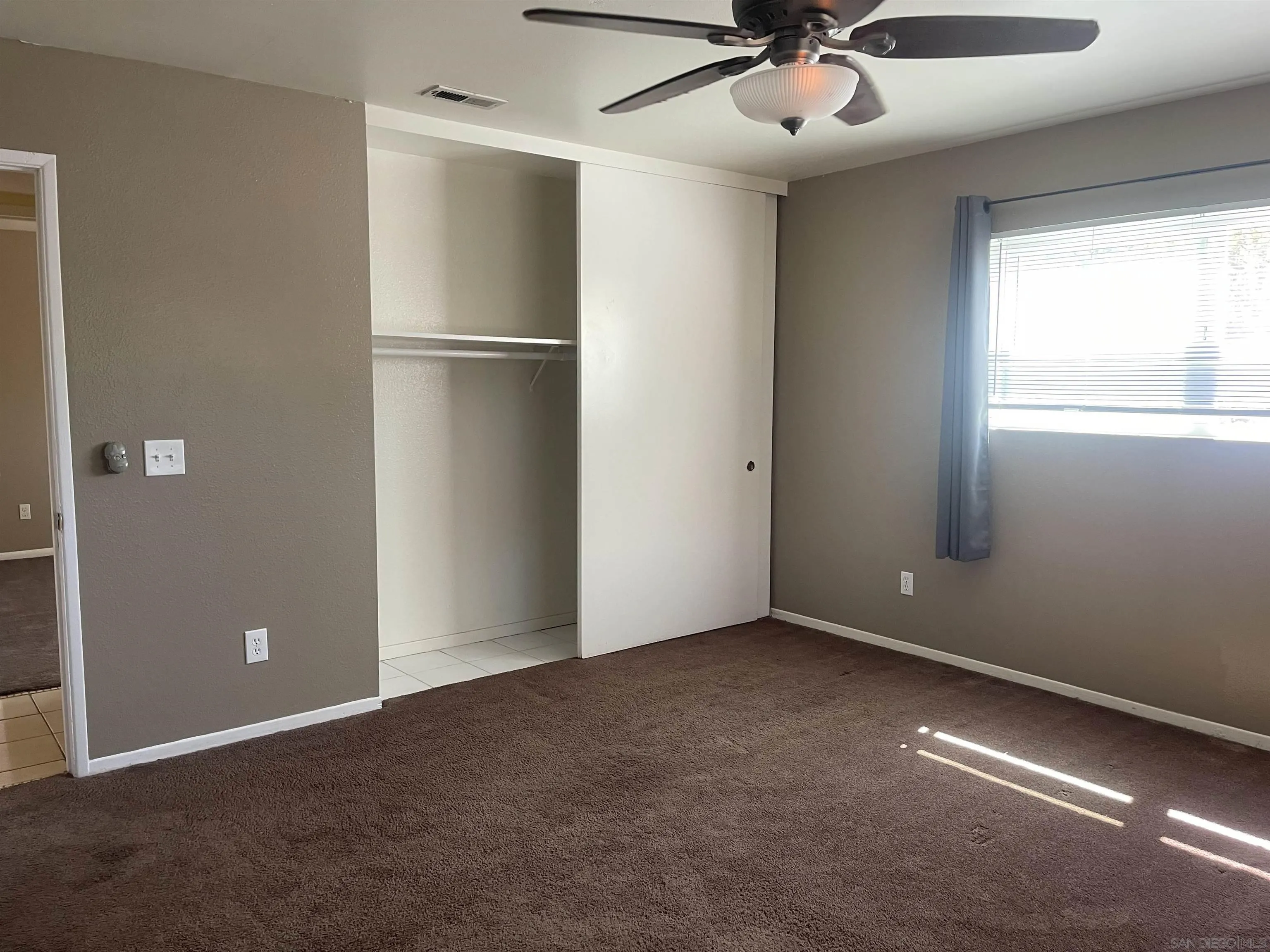 2248 La Cresta Road El Cajon, CA 92021 - Photo 5 of 11 a view of an empty room with a window