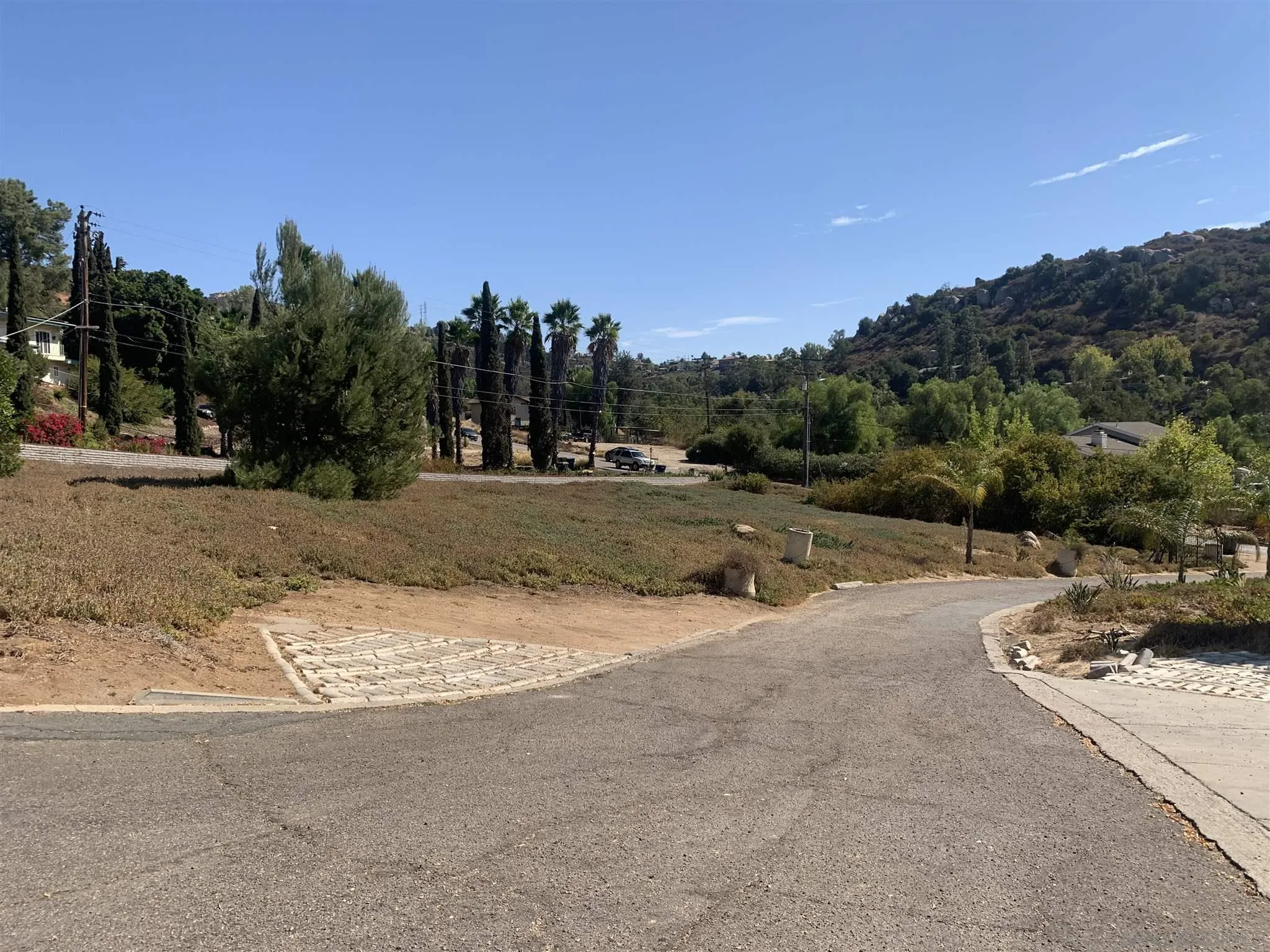 2248 La Cresta Road El Cajon, CA 92021 - Photo 6 of 11 a view of a road with a building in the background