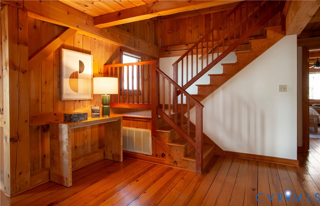 877 Twiggs Ferry Road Hartfield, VA 23071 - Photo 25 of 34 a view of entryway with wooden floor