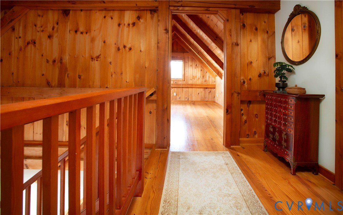 877 Twiggs Ferry Road Hartfield, VA 23071 - Photo 27 of 34 a bathroom with a sink and a mirror
