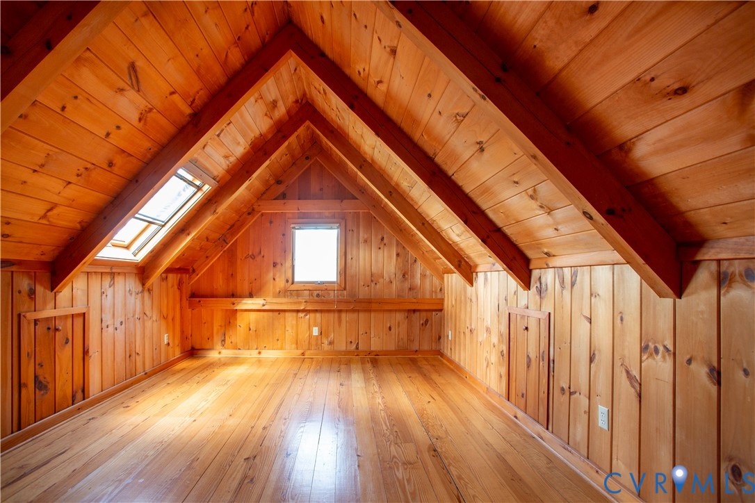 877 Twiggs Ferry Road Hartfield, VA 23071 - Photo 28 of 34 a view of outdoor space with wooden floor and fence