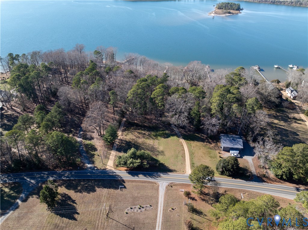 877 Twiggs Ferry Road Hartfield, VA 23071 - Photo 5 of 34 an aerial view of a house with a yard