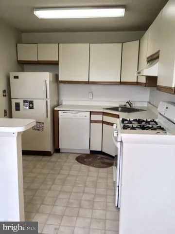 a large spacious bathroom with a large tub and outer view