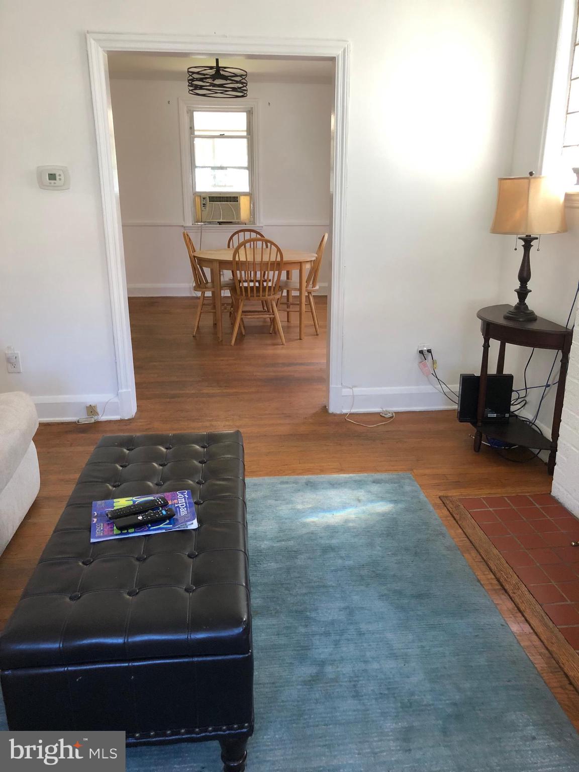 5105 Edgar Terrace Baltimore, MD 21214 - Photo 11 of 63 View from living rm to dining rm & wood floors