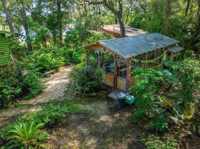 a backyard of a house with lots of green space