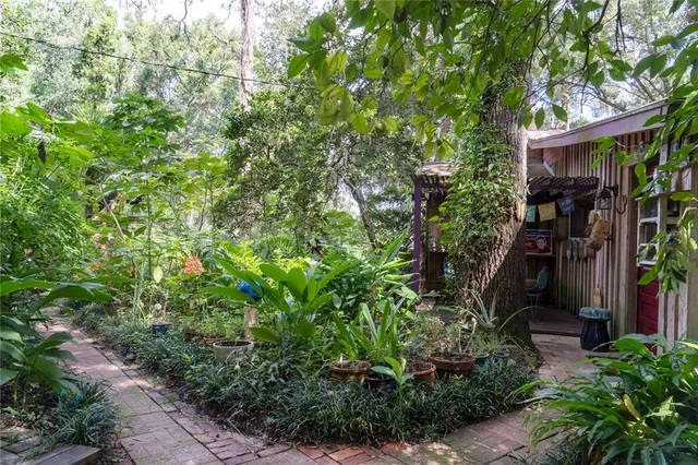a kitchen with stainless steel appliances granite countertop a stove and a cabinets