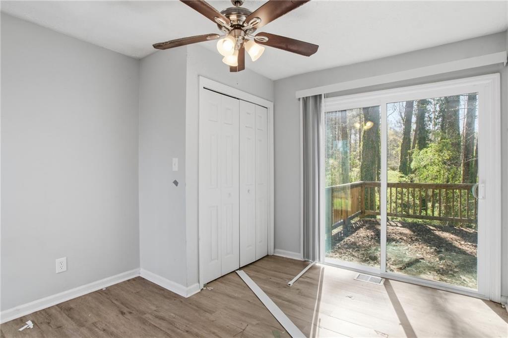 720 Twin Pines Road Covington, GA 30014 - Photo 25 of 40 a view of a room with wooden floor and balcony