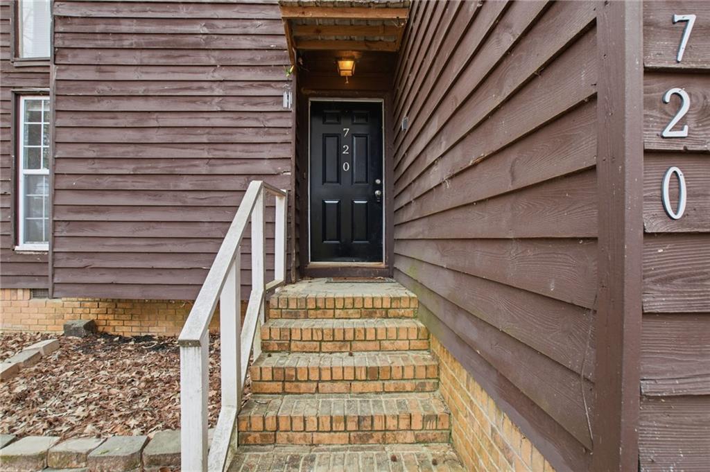 720 Twin Pines Road Covington, GA 30014 - Photo 4 of 40 a view of entryway with a front door