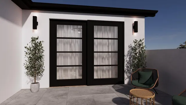 a bathroom with a toilet and a shower curtain