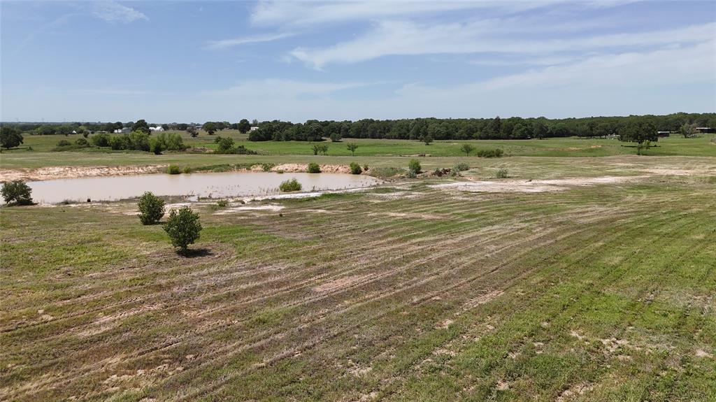 8605 West Highway 199 Springtown, TX 76082 - Photo 22 of 23 a view of a lake with houses in the back
