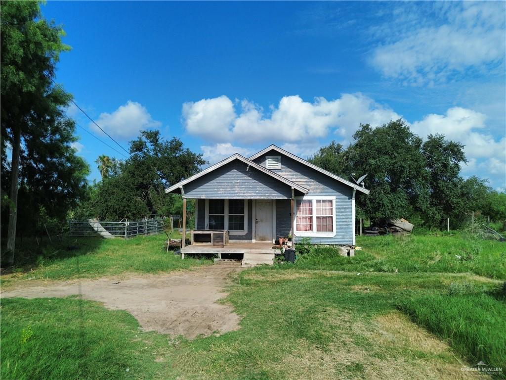 4713 North Minnesota Road Mission, TX 78574 - Photo 1 of 1 Bungalow-style home with a front lawn