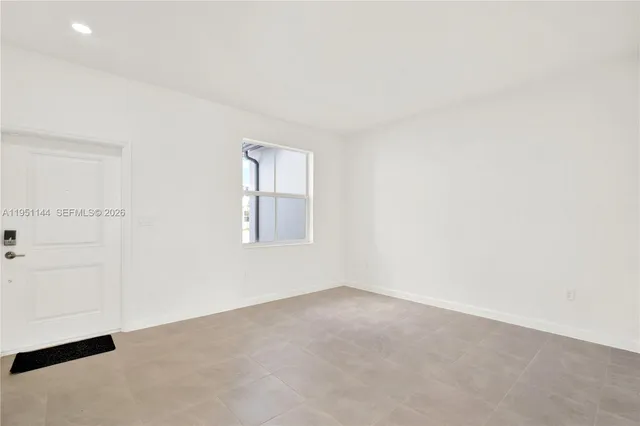 an empty room with a window