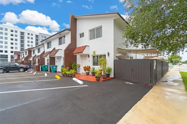 a view of a street with cars